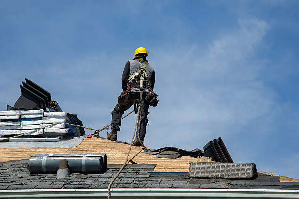 Professional Roofing technician working in Cogan Station, PA